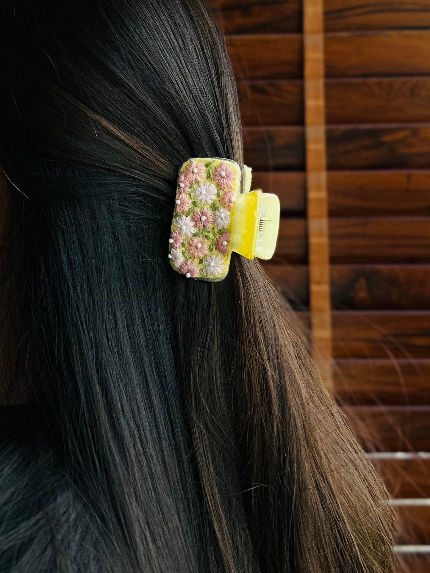 Embroidered clutcher