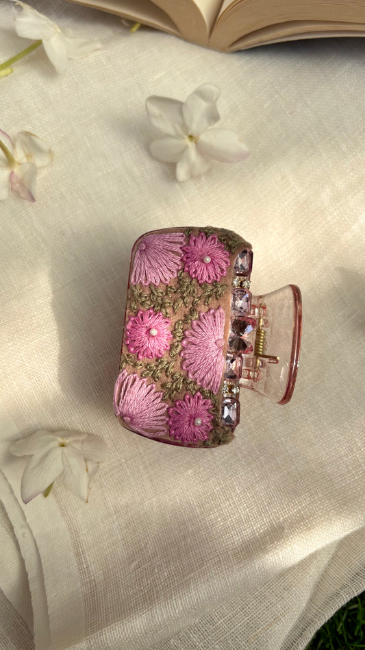 Embroidered clutcher