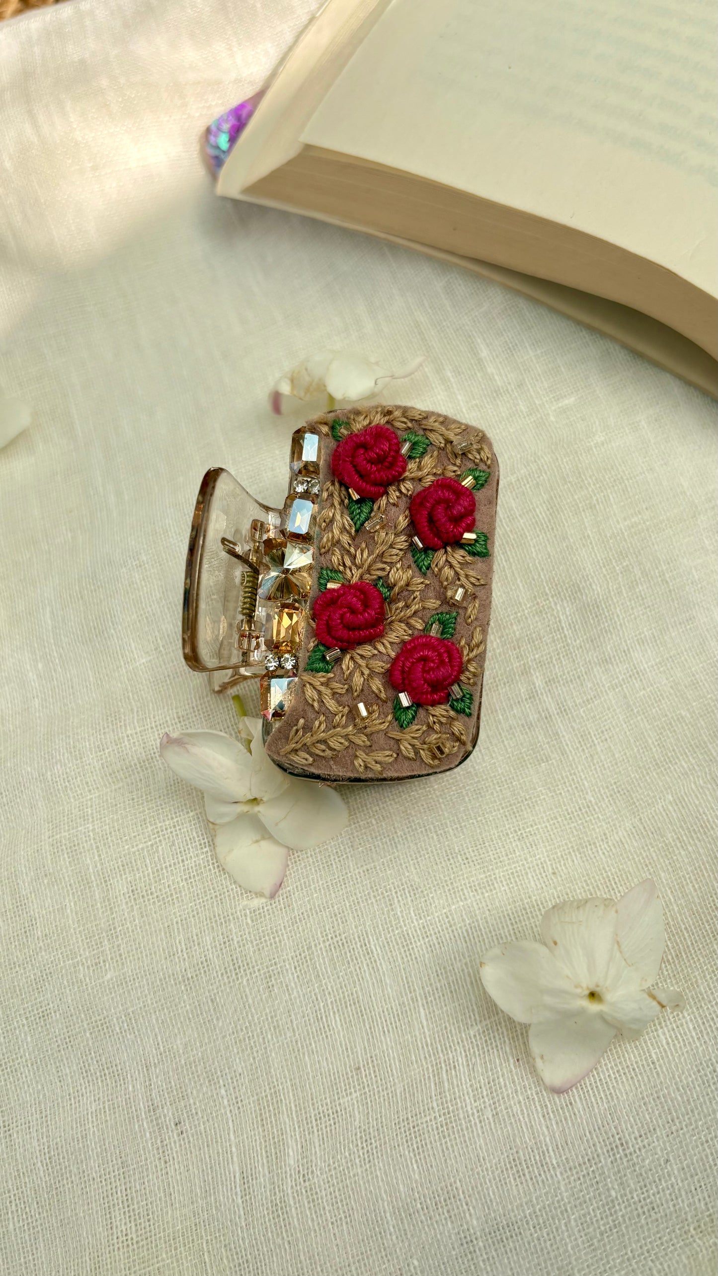 Embroidered clutcher