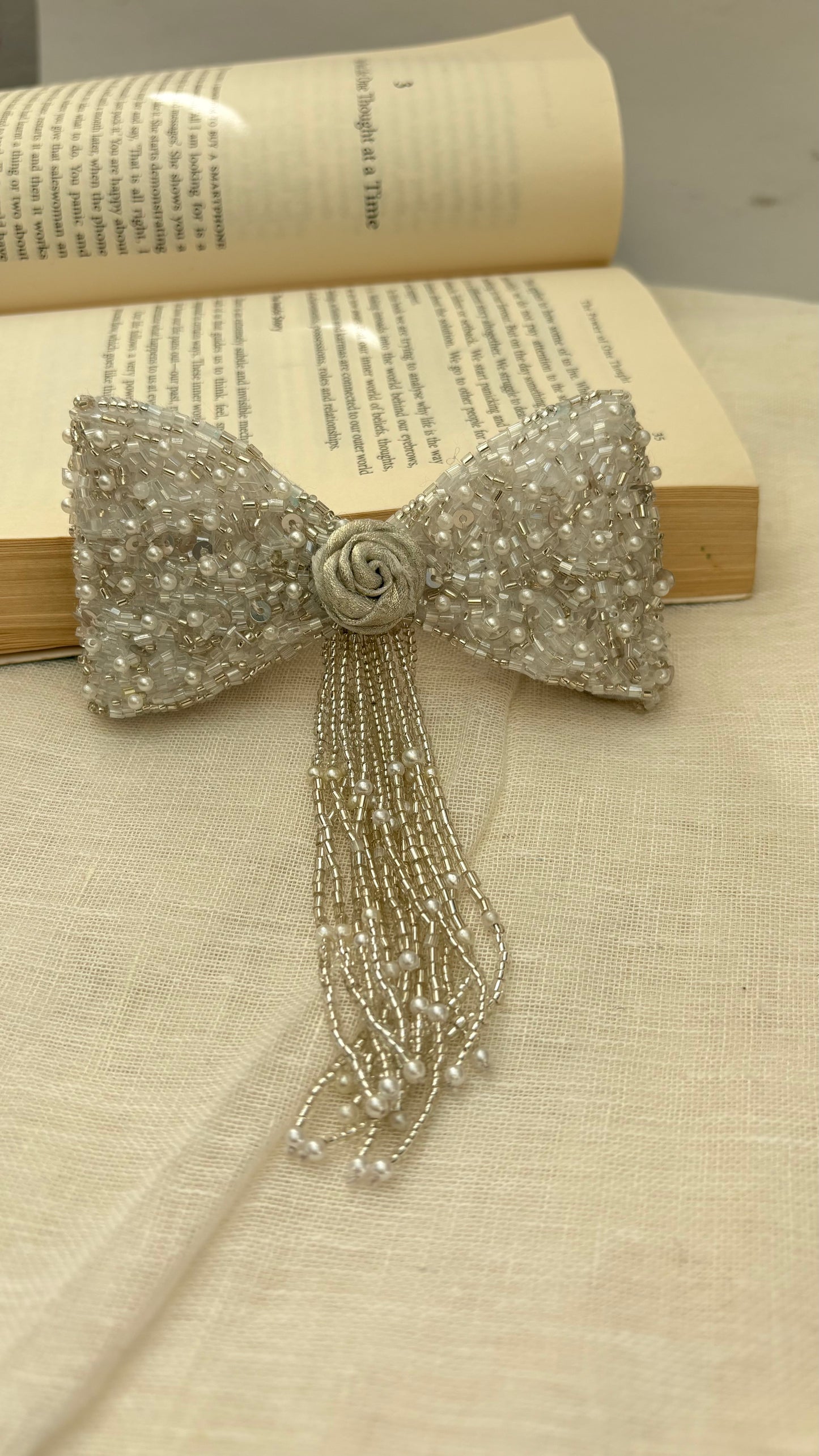 Ivory pearl fall bow