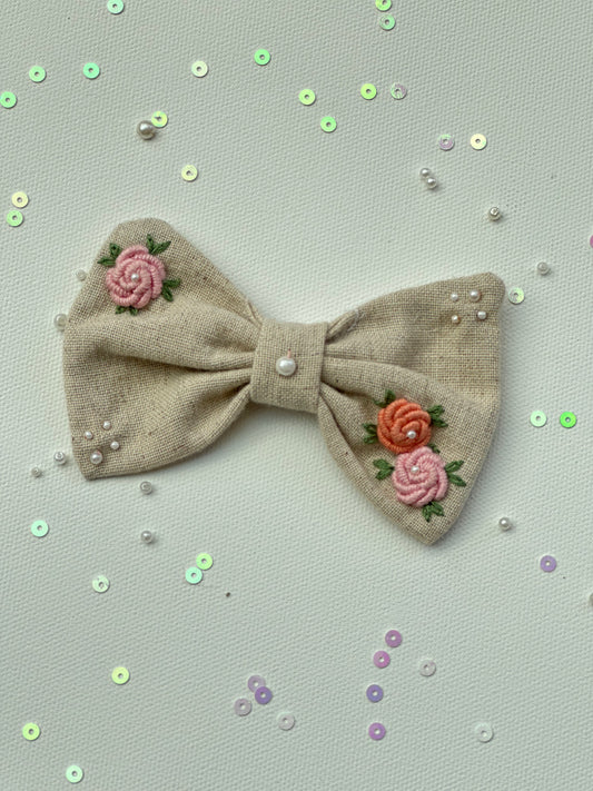 Rosy pearl bow